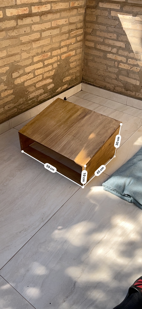 Reposa pie de madera